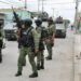 Mexican soldiers stand guard after being accused by people, of having participated with other military members in the shooting deaths of five people, in Nuevo Laredo, Mexico February 26, 2023. REUTERS/Jasiel Rubio NO RESALES. NO ARCHIVES