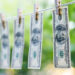 Money Laundering. Money Laundering US dollars hung out to dry. 100 dollar bills hanging on clotheslines